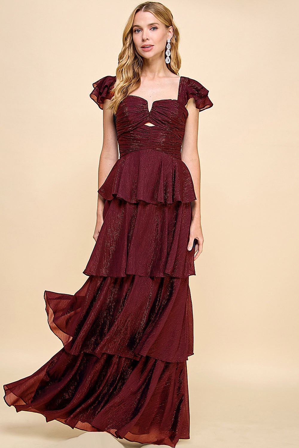 Vestido de olanes y manga corta con espalda descubierta