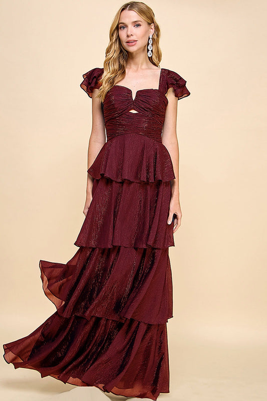 Vestido de olanes y manga corta con espalda descubierta